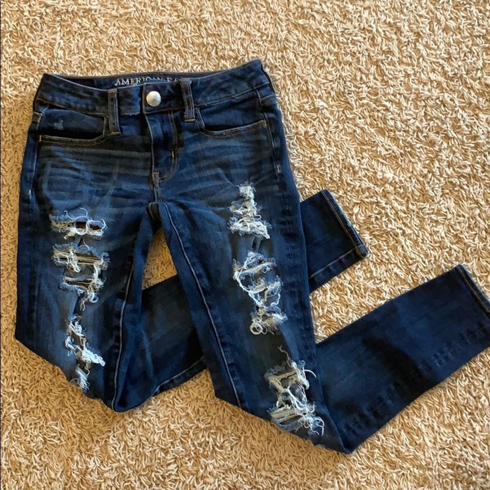 distressed dark wash american eagle jeans